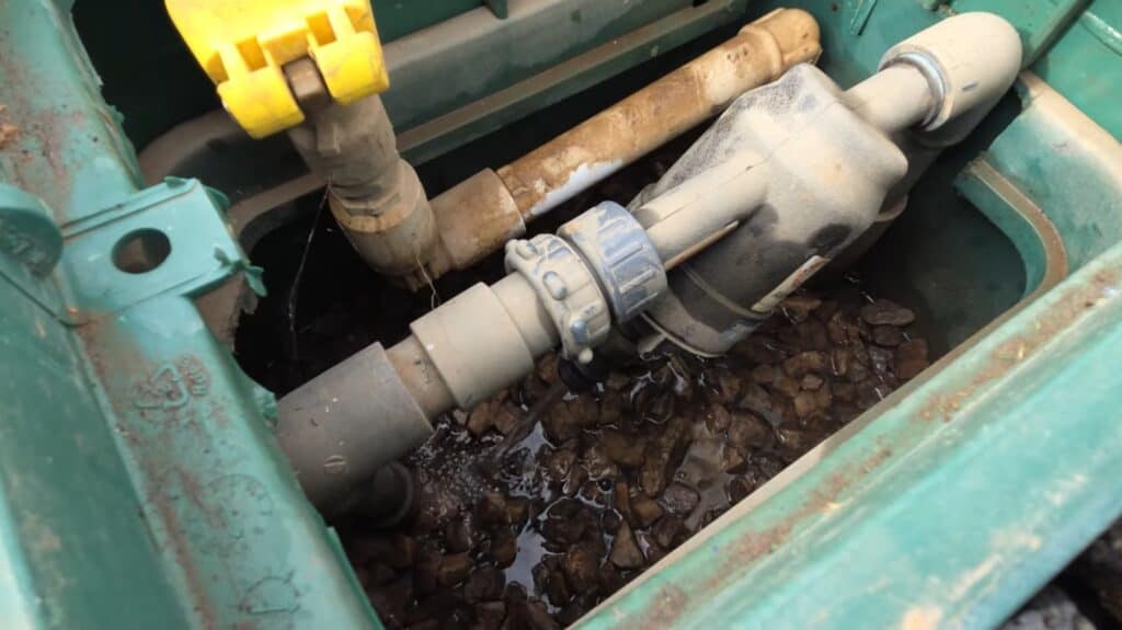 how to drain water filter in a sprinkler system