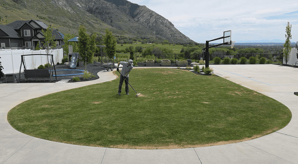 brush the sand into the lawn